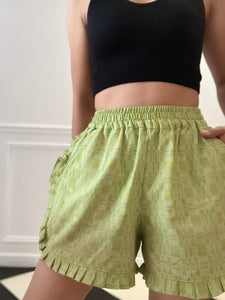 Mademoiselle shorts in yellow green with ruffles